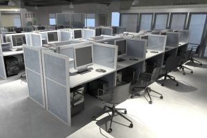 cubicles in an office with technology insurance