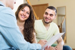 homeowners speaking to a life insurance broker in Los Angeles, CA