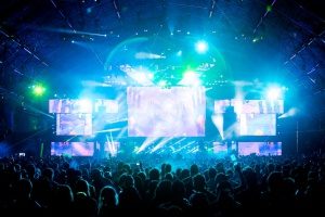 mega concert where a band with music tour insurance is playing so they are fully protected from injuries on site