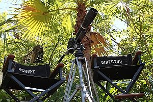 director and writer chairs at a production set containing cameras and light fixtures that are all protected under a good production insurance plan