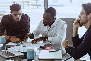 a team of technology consultants who are speaking with a technology insurance company to file a claim after their data was breached and hacked