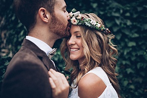 a couple taking pictures after their wedding