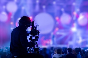 a man filming a festival that needs filmmakers protection against liabilities