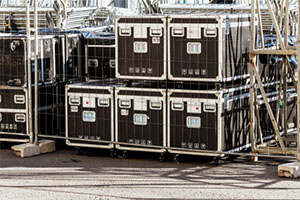 tour equipment in black containers