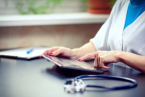 Doctor using tablet in hospital 