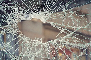 a broken window in a marijuana dispensary due to vandalism that has property damage liability