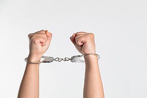 a man in handcuffs for marijuana possession in Indiana