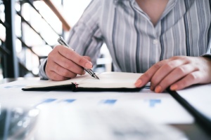 owner looking at a contract to know How much does errors and omissions insurance cost