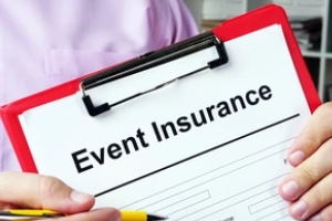 man holding clipboard with event insurance form