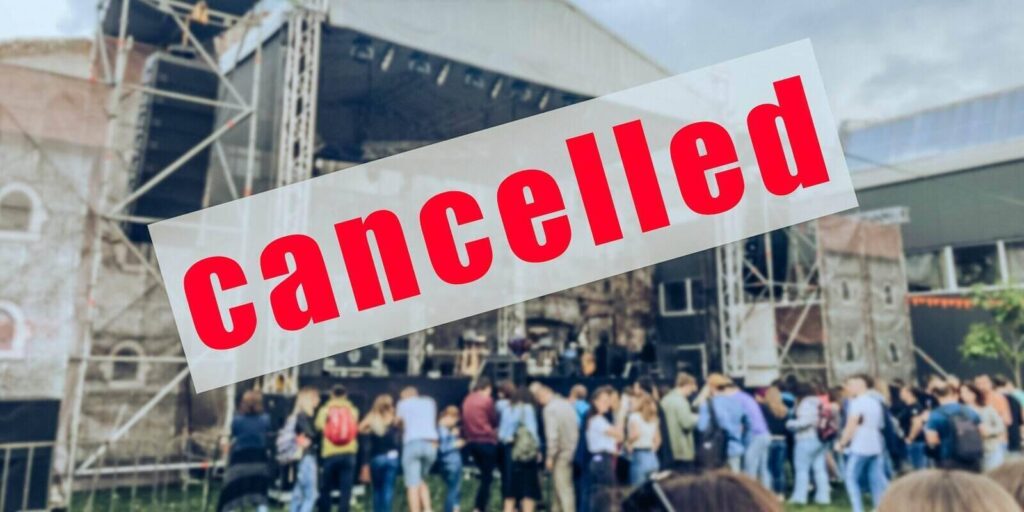 a warning sign that a concert or other event has been canceled