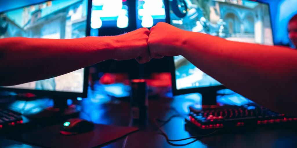 gamer greeting and support team fists hands online