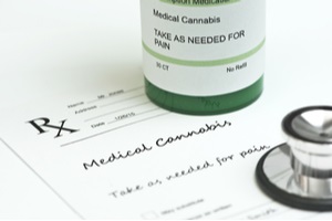 medical marijuana prescription with bottle and stethoscope