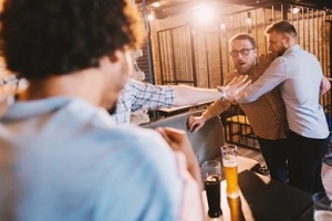 drunk people fighting in a wine bar protected with wine bar insurance