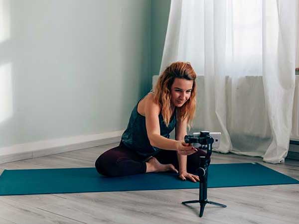 Woman setting up her camera for a web short