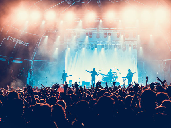 audience view of touring band in concert