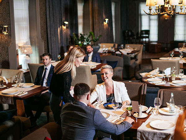 couple being served at a modern restaurant