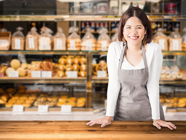 female business owner of a bakery shop