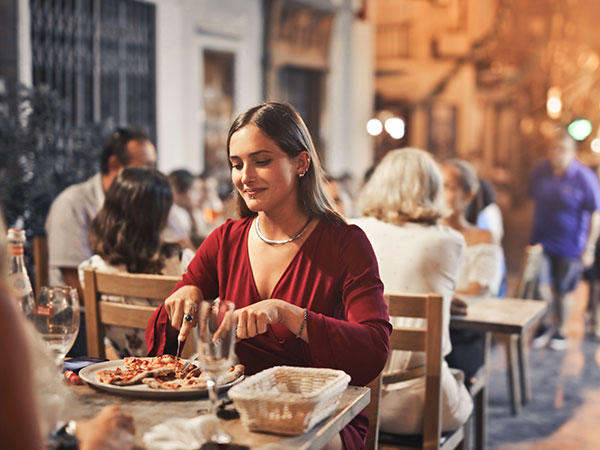 women eating at an outdoor dining restaurant