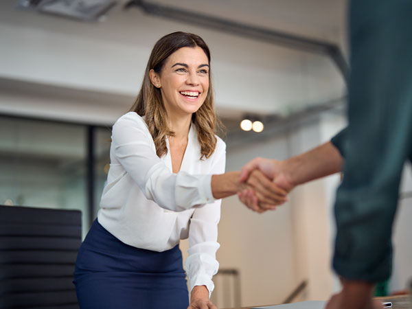 CEO shaking hands with business partner