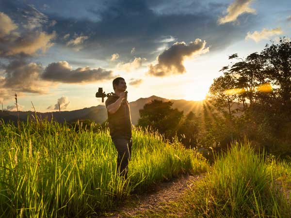 Film director in fields of Ireland who is protected by production insurance for foreign films