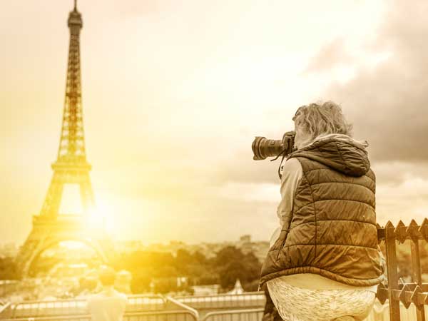 Videographer taking b-roll footage in Paris, France