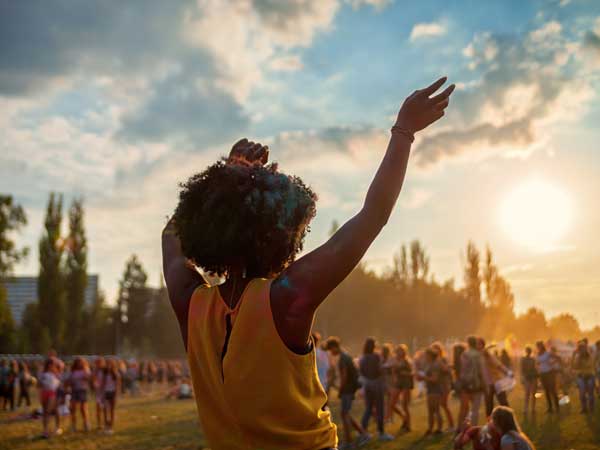 Woman having fun dancing at festival