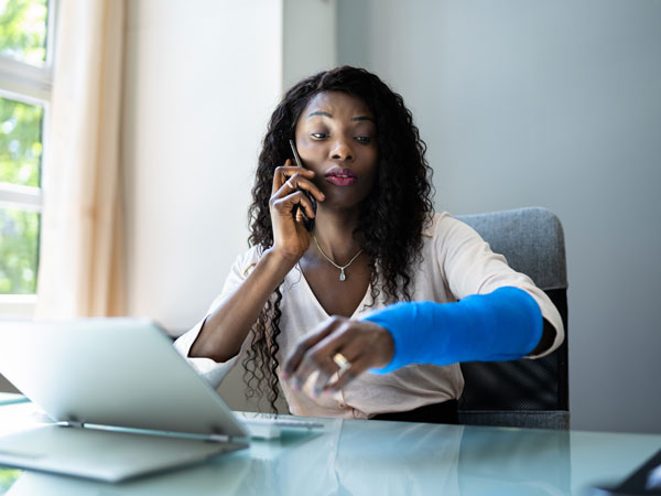 Woman who broke her arm at work