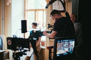 director of photography with a camera in his hands on the set