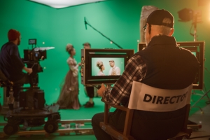 Director Shooting Film in Green Screen with Actors