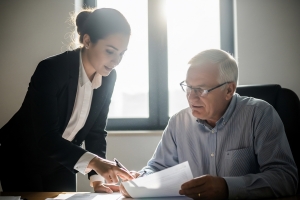 Insurnace Agent Explaining Commercial Video Production Insurance to Producer