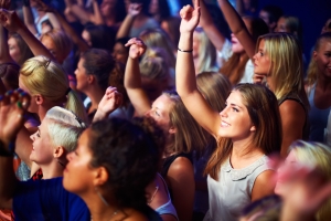 Crowd Enjoying Music Event While Singing Along to Their Favorite Song