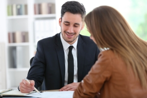 Event Manager Discussing Insurance Quote with Agent